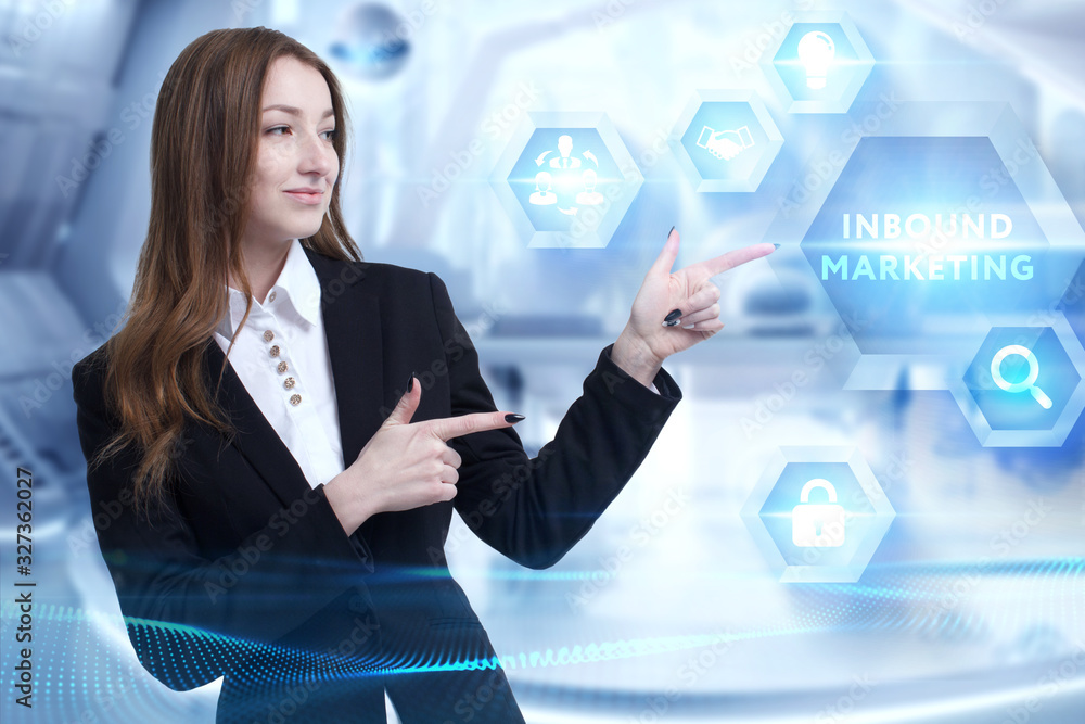 Business, Technology, Internet and network concept. Young businessman working on a virtual screen of the future and sees the inscription: Inbound marketing Business, Technology, Internet and network concept. Young businessman working on a virtual screen of the future and sees the inscription: Inbound marketing