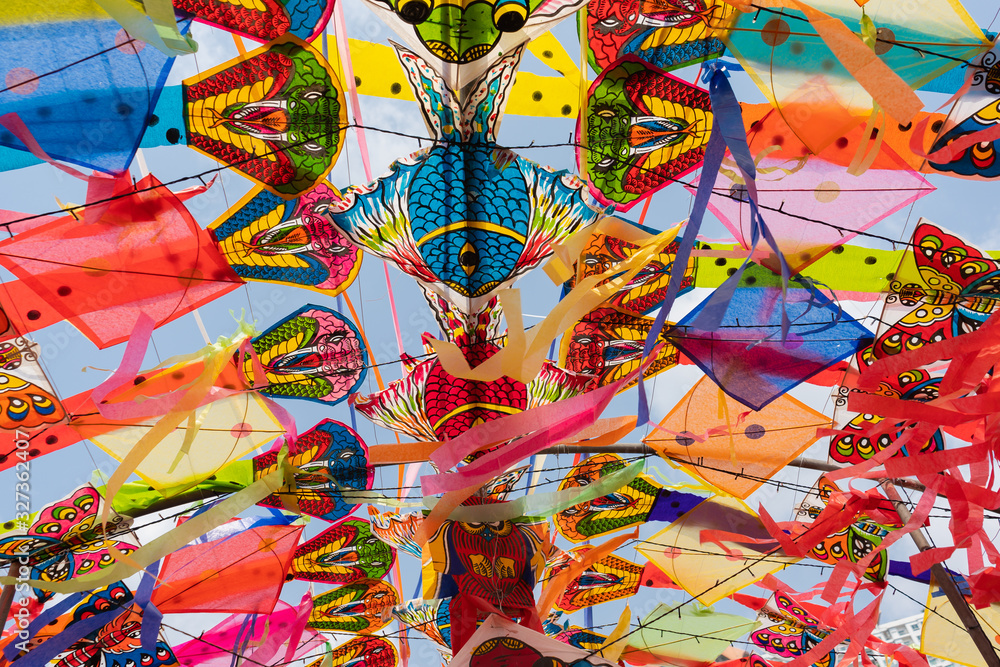 Fototapeta premium Colorful kites group for background. Toy for sport and recreation activity game