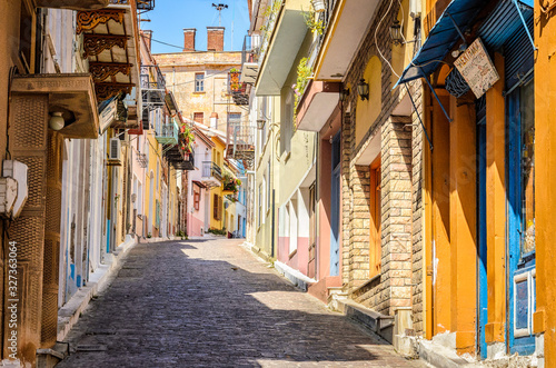 The paved streets of the beautiful village of Agiasos in Lesvos with colorful traditional houses © Andreas Lorentzatos