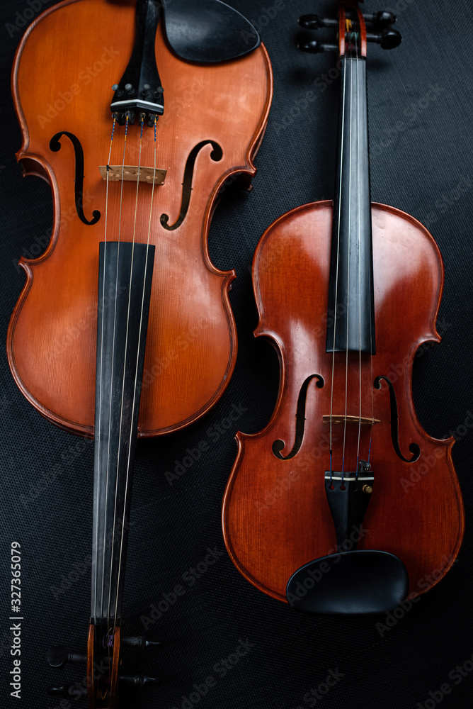 Violin and Viola put on background,show front side of acoustic instrument Violin and Viola put on background,show front side of acoustic instrument
