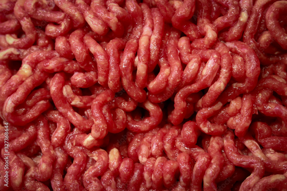 Fresh raw minced meat background. Fresh raw minced meat background.