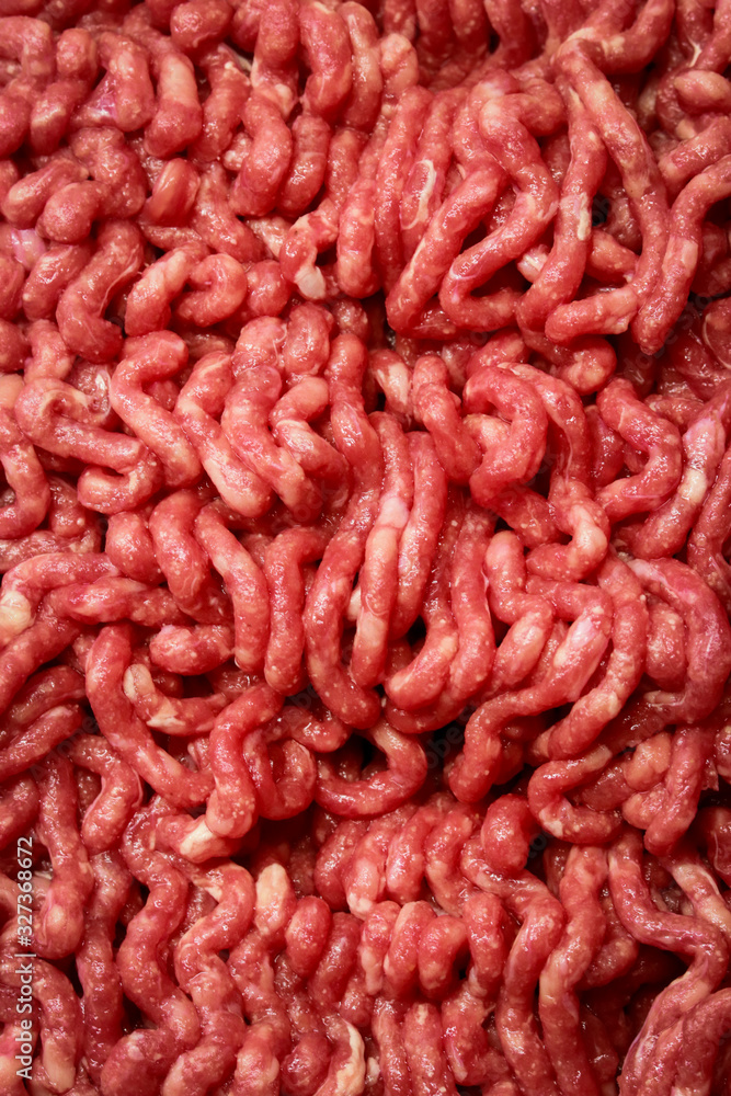 Fresh raw minced meat background. Fresh raw minced meat background.