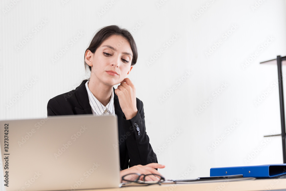 A businesswoman has concentrate working with and upset and unhappy. A businesswoman has concentrate working with and upset and unhappy.