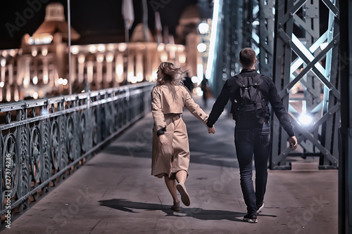 Photography couple in love winter Budapest, tourism Hungary, a young couple a walk around th