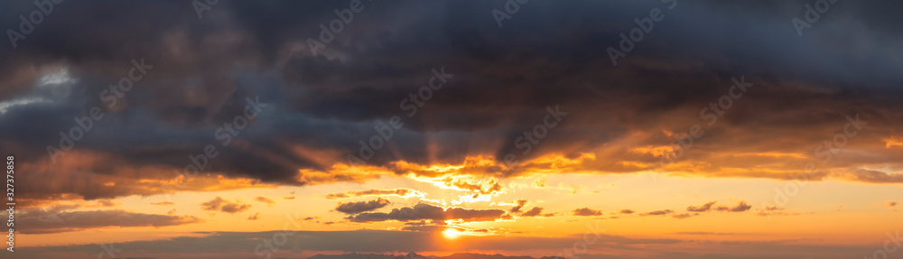 Amazing sunset with a dramatic cloudy sky