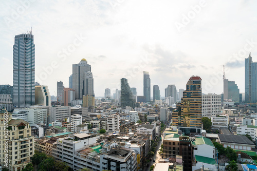 Aerial cityscape of picturesque Bangkok at daytime from rooftop. Panoramic skyline of the biggest city in Thailand. The concept of metropolis. © VideoFlow