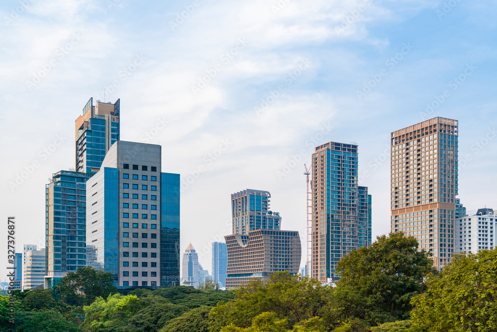 Aerial cityscape of picturesque Bangkok at daytime from rooftop. Panoramic skyline of the biggest city in Thailand. The concept of metropolis. Aerial cityscape of picturesque Bangkok at daytime from rooftop. Panoramic skyline of the biggest city in Thailand. The concept of metropolis.