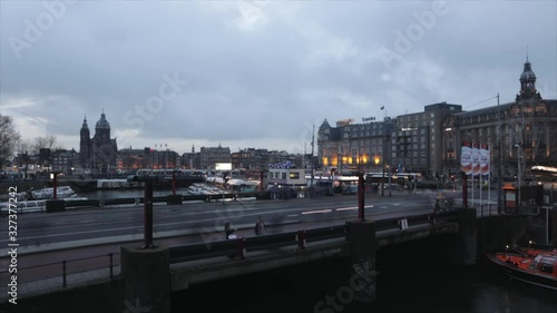 Wallpaper Mural Famous canals and embankments of Amsterdam city. General view of the cityscape and traditional Netherlands architecture. HD Time Lapse 2 in 1. Torontodigital.ca