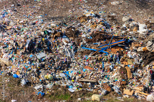 Aerial view of city garbage dump. Pile of plastic trash, food waste on landfill. Environmental pollution concept