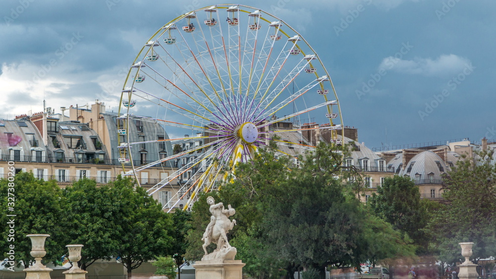 Fototapeta premium Ferris wheel Roue de Paris on Tuileries Garden timelapse. Paris, France.
