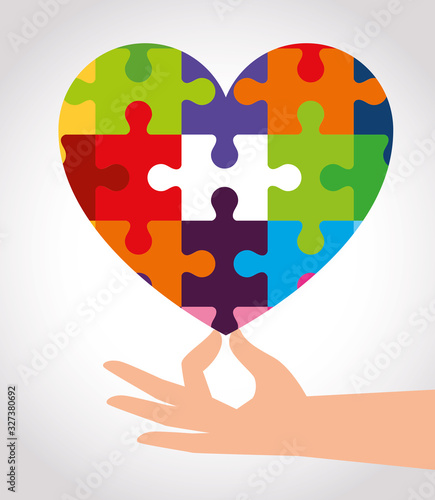 world autism day with heart of puzzle pieces vector illustration design