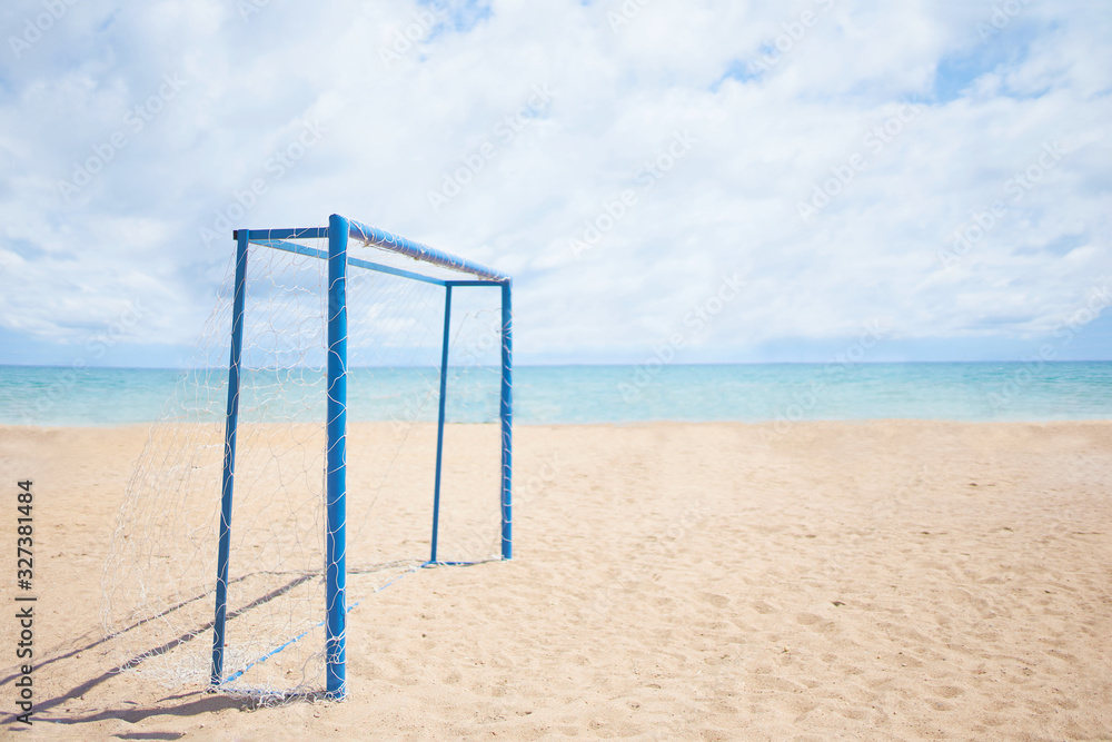 Football goal on the shore. View of the sea beach through the blue, football goal. Football goal on the shore. View of the sea beach through the blue, football goal.
