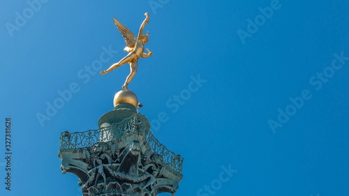The column and statue at the Place de la Bastille timelapse in Paris. photo