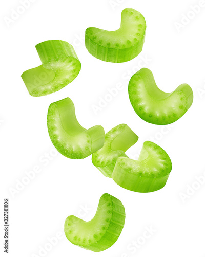 Falling celery slice isolated on white background, clipping path, full depth of field