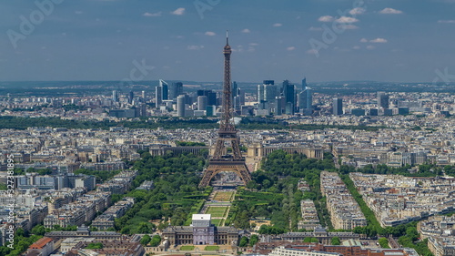 Aerial view from Montparnasse tower with Eiffel tower and La Defense district on background timelapse in Paris, France.