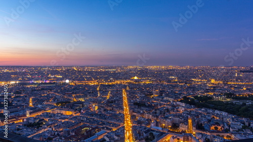 Panorama of Paris after sunset day to night timelapse. Top view from montparnasse building in Paris - France