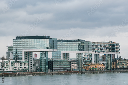 Kranhäuser in Cologne with dark clouds © Anton Blanke