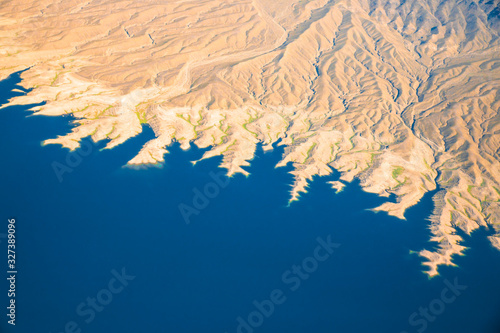  Aerial Photography of landforms over Nevada with Lake Mead in view.
