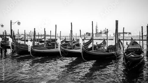 Gondolas by Saint Mark square with San Giorgio di Maggiore church, Venice
