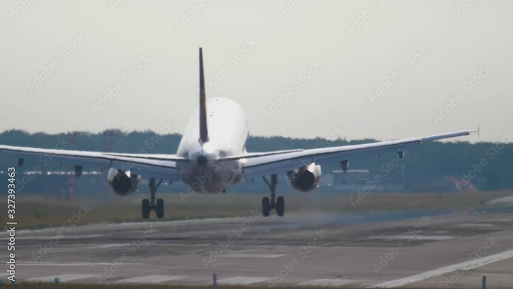 Airplane landing at the early morning Airplane landing at the early morning