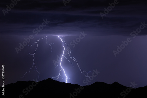 Storm with lightning strike and night sky