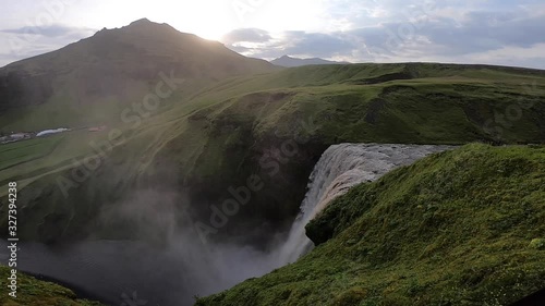 Wallpaper Mural Skogafoss waterfall from the top in slow motion during sunset. Iceland Torontodigital.ca