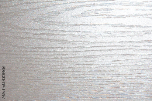 Texture of pearlescent white wood. White wooden background.