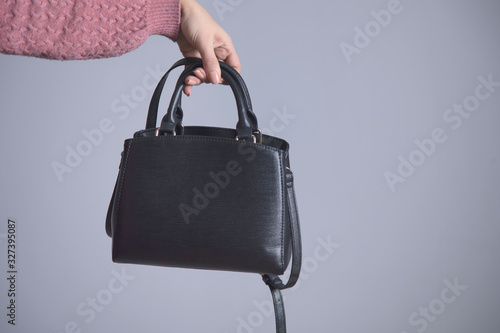 woman hand black bag