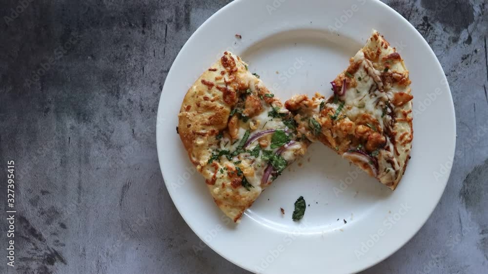 Hands Eating a Barbeque Chicken Pizza Hands Eating a Barbeque Chicken Pizza