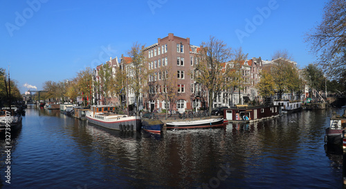 Canal with house boats in Amsterdam, Holland