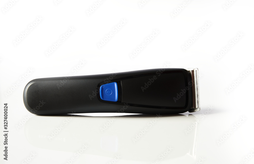 hair cutter machine on a white table front view hair cutter machine on a white table front view