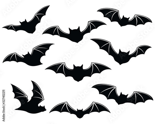 Black silhouettes of bats. isolated on white background. vector icon illustration