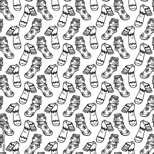 Clothes background. Socks Vector Seamless pattern. Hand drawn doodle socks. Black and white illustration