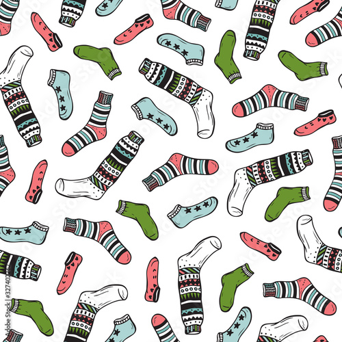 Clothes background. Socks Vector Seamless pattern. Hand drawn doodle socks and stockings