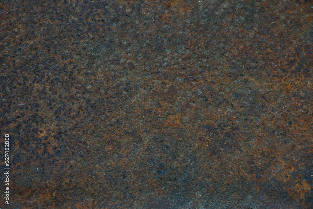 Rusty dark sheet of iron close-up. Texture Rusty dark sheet of iron close-up. Texture