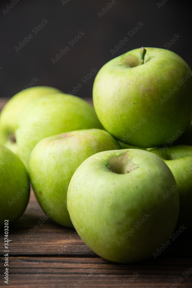 beautiful green apples close-up on the table beautiful green apples close-up on the table