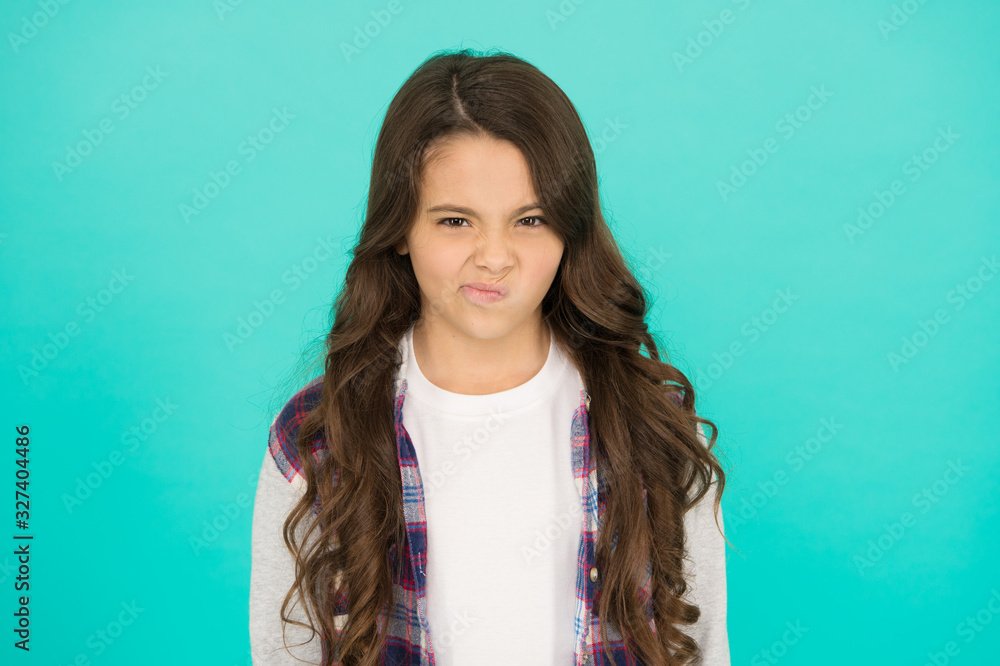 Fototapeta premium I do not like you. Have some doubts. Emotional kid. Girl emotional face. Thoughts and doubts concept. Kid doubtful face. Thoughtful girl hesitating making decision. Weird feeling. Doubts bothering me