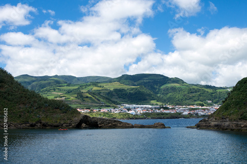 View of the beautiful village of Vila Franca do Campo on the island of San Miguel from the volcanic uninhabited island of Vila Franca, Azores, Portugal. Travel to the Azores.