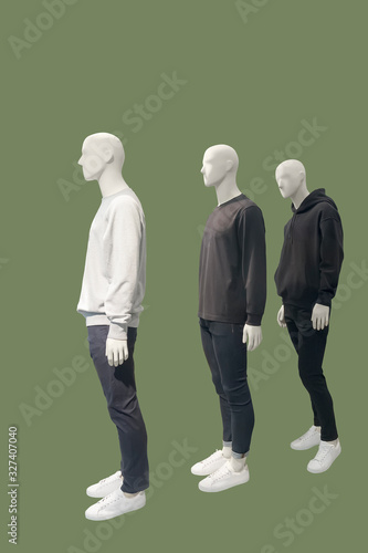 Three male mannequins.