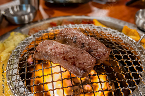 close up shot of Korean style BBQ meat photo