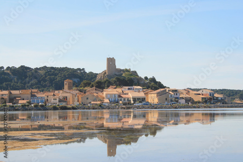 The old town of Gruissan in the heart of Regional Natural Park of Narbonne, dominated by its castle, the ruins of the Barberousse tower and its small fishermen's houses, Aude, France