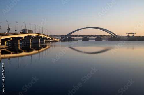 View across the Dnieper River to the bridge under construction. Near the Havana bridge in Kiev