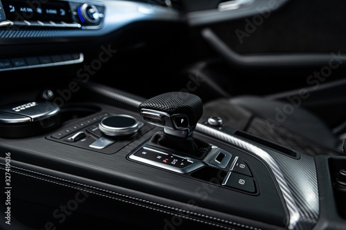 Automatic gearbox lever shifter. Car interior
