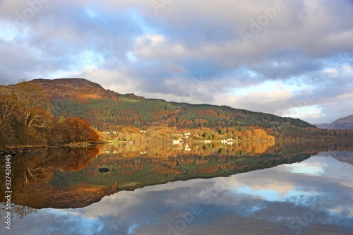 Fototapeta Naklejka Na Ścianę i Meble -  Reflections in Loch Lomond, Scotland