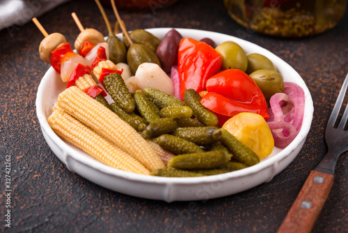 Assortment of marinated or pickled vegetable.