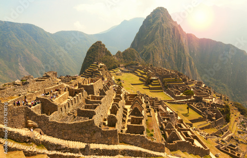 Machu Picchu, Cusco region, Peru: Overview of agriculture terraces, Wayna Picchu and surrounding mountains in the background, UNESCO, World Heritage Site. One of the New Seven Wonders of the World photo