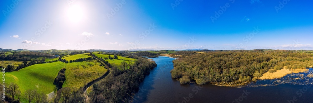 panorama aerial  view of sunny quoile river  winter countryside in Downpatrick,Northern Ireland