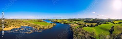 panorama aerial view of sunny quoile river winter countryside in Downpatrick,Northern Ireland