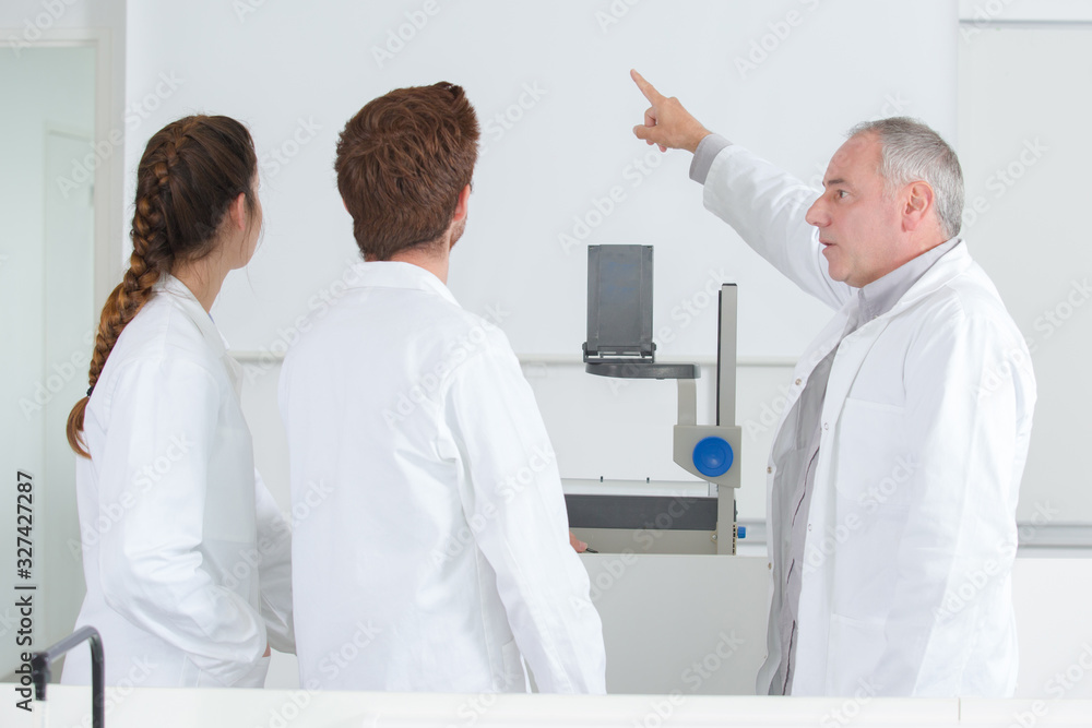 profession pointing at the white board profession pointing at the white board