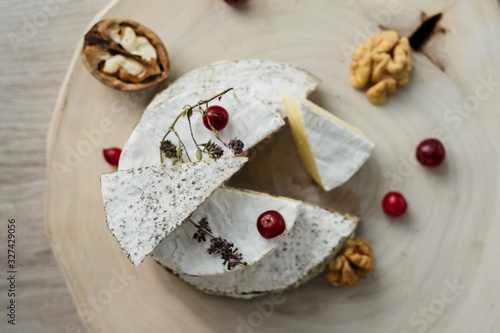 craft organic cheese (camembert, brie) with berries